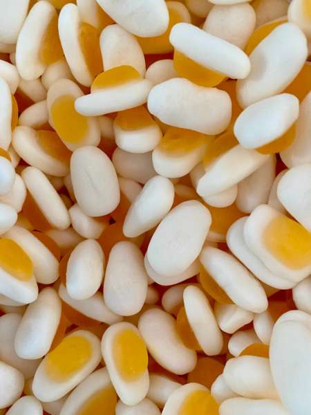 Swedish Mini EgCandy Citrus Gummy Candy On Top Of Vanilla Fluffy Foam