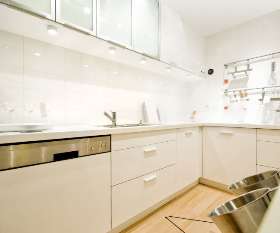 M13 White melamine kitchen with aluminium glass feature doors