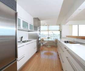 M15 Galley style Polyurethane plain panel doors with stone top and long bar handles