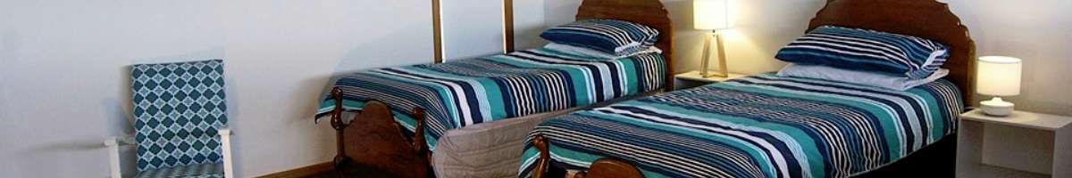 Penguin Beachfront Apartments Banner