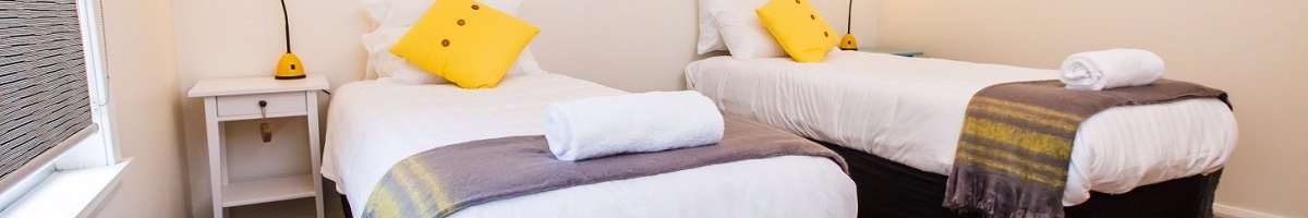 Indulge Apartments Banner