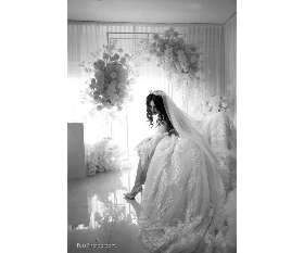 A Margarita Standing in Her Full Wedding Attire - Fuss Photography