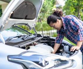 A Man Inspecting Under The Bonnet Before Buy A Used Car - Pre Purchase Car Inspection Tips | German Precision