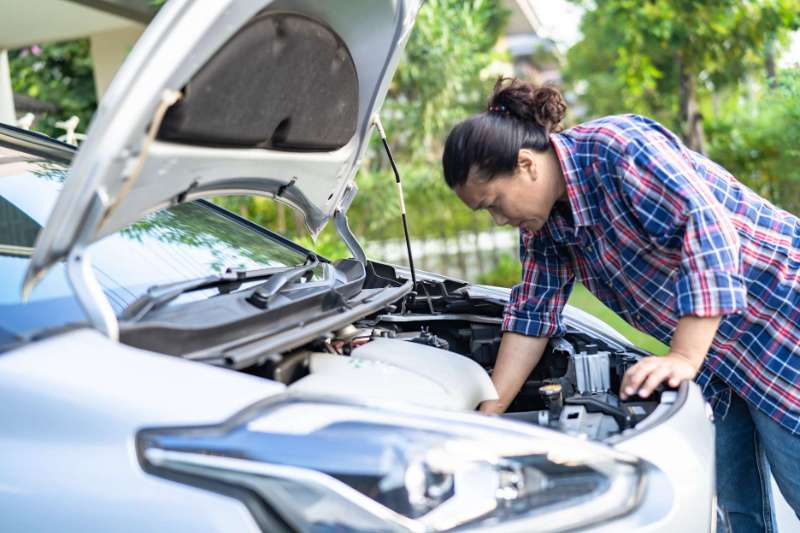 A Man Inspecting Under The Bonnet Before Buy A Used Car - Pre Purchase Car Inspection Tips A Man Inspecting Under The Bonnet Before Buy A Used Car - Pre Purchase Car Inspection Tips