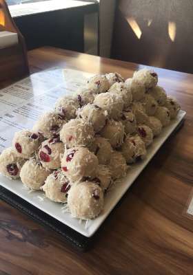 Protein balls - coconut, cranberry & vanilla protein powder. 