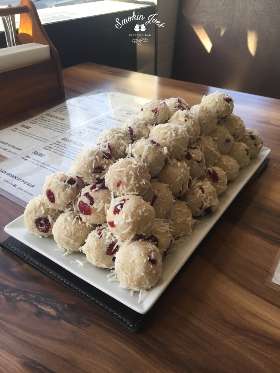 Homemade macadamia, coconut & cranberry protein balls - Smokin Joes Espresso Bar in Everton Park