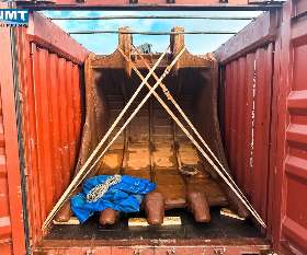 Heavyweight Hitachi EX1200-6 Excavator Shipping: Dismantled components in containers, main body on Roll-on-Roll-off vessel for journey from Australia to China.