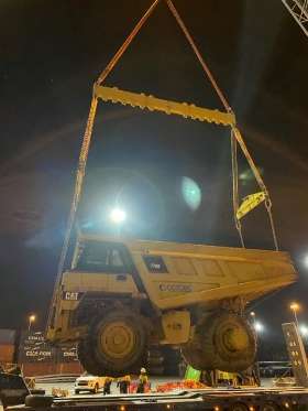 CAT 775E Overcoming Challenges in Darwin-Singapore Transport | NMT Shipping Custom Brokers