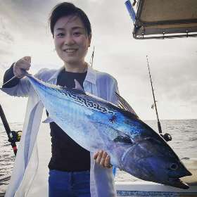 Holding the Fish - True Blue Fishing
