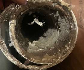 CityWide Dryer Vent Cleaning clogged vent opening