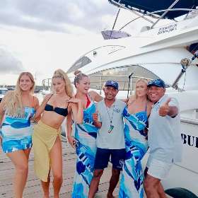 Fun pic with this colourful crew on our 58ft super glam Bujurman - Pulau Private Charters