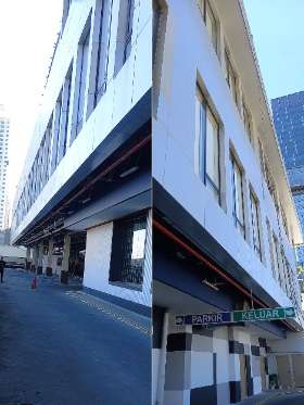 Pembersihan Kaca Gedung