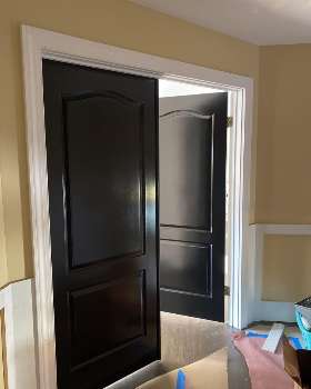Black master bedroom doors with Benjamin Moore soft gloss black | Hudson Paint Contracting