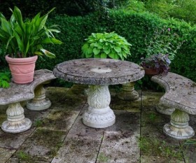 How to Decorate Your Garden With Stone Seats and Tables